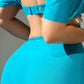 Jasmine – Türkisfarbenes Outfit mit Schlitzrock